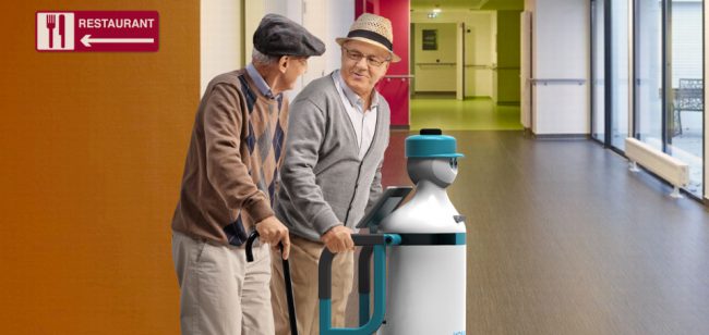 KOMPAÏ robot assisting older persons to walk between the restaurant and the living room