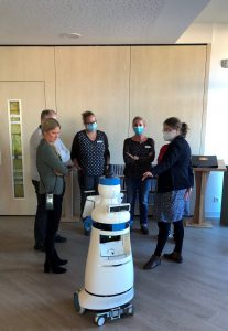 Bettina Meenen (gewi) showing Kompai to staff from the nursing home.